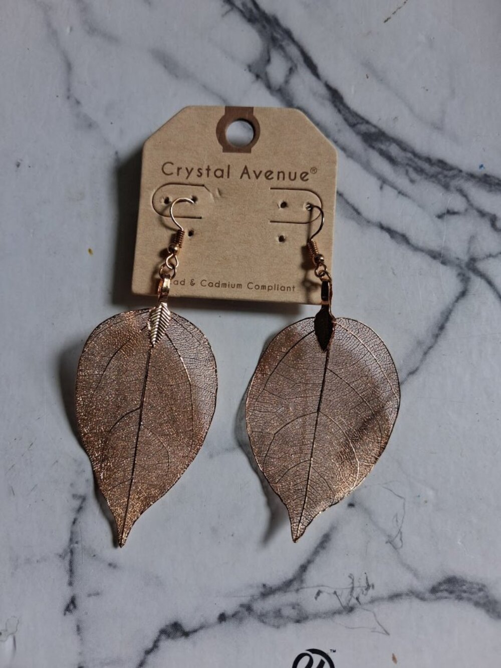 Crystal Avenue leaf dangle earrings